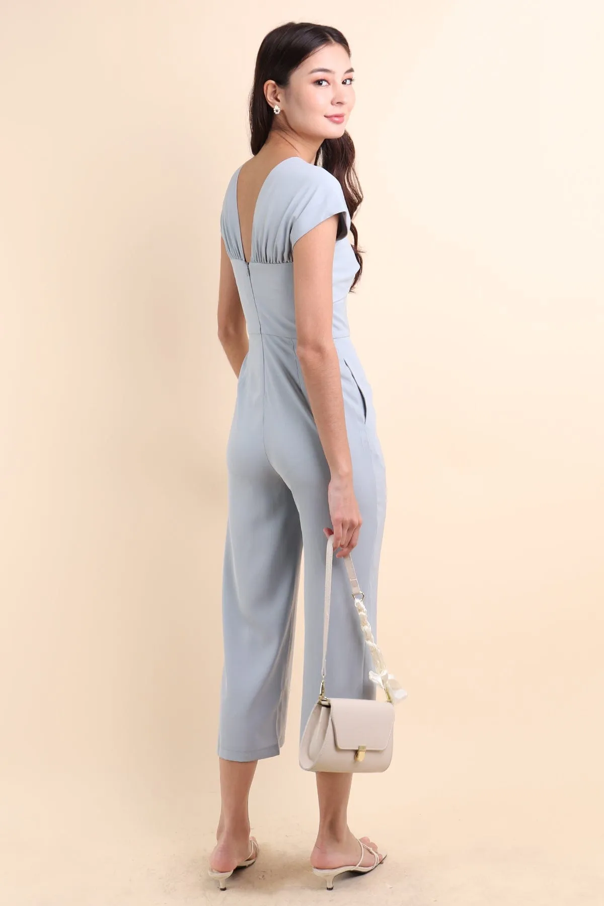 MIRANDA TWIST-DETAIL JUMPSUIT IN PIGEON BLUE